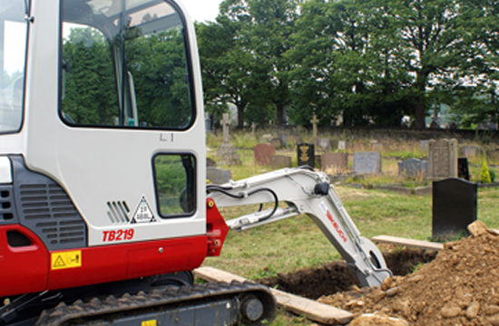 right side view of a takeuchi tb219 with the long boom showing great spec on this machine