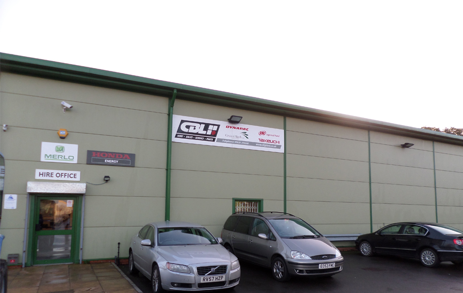 a couple of cars parked in front of CBL building for Thatcham, Newbury.