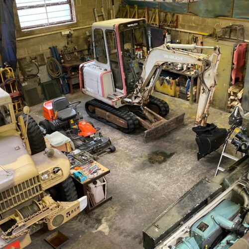 Takeuchi TB025 Digger in a warehouse parked up