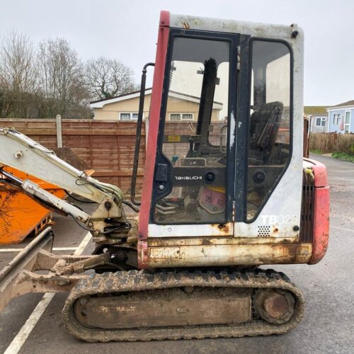 Takeuchi TB025 Excavator view from the size with cabin digger