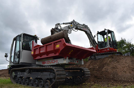 Takeuchi bucket emptied into dumper