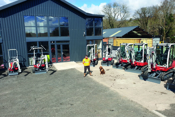 Mann Hire Dealer Depot with some takeuchi excavators lined up in front
