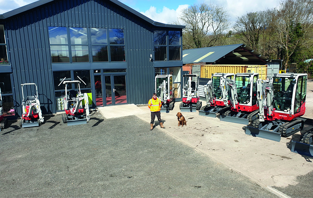 Mann Hire Dealer Depot with some takeuchi excavators lined up in front