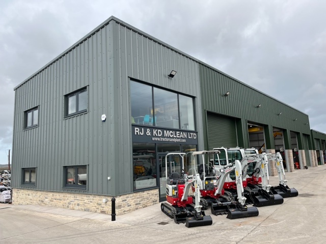 mcLeans depot with takeuchi diggers outside