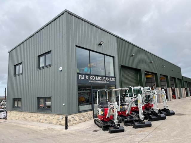 mccleans depot with takeuchi diggers