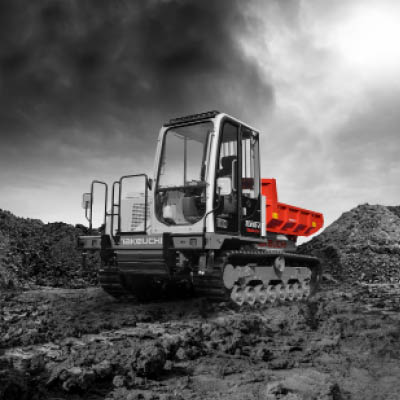 tcr50-2 takeuchi tracked dumper in colour on a black and white background
