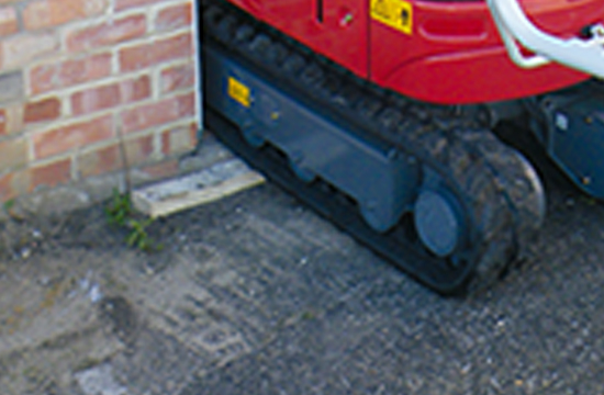 takeuchi tb210r micro digger fitting through a doorway for construction sites with tight operating areas