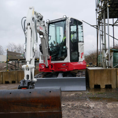 takeuchi tb335r digger on construction site