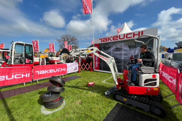 an operator attempting takeuchi time operator challange with tyres