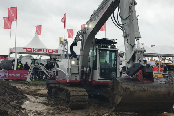 tb2150r excavator with lights on muddy site