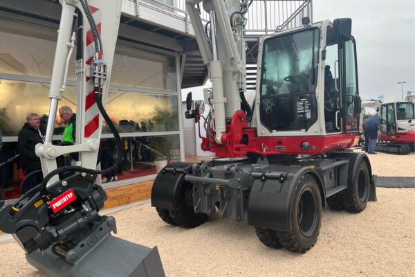 takeuchi wheeled excavator parked up with boom down