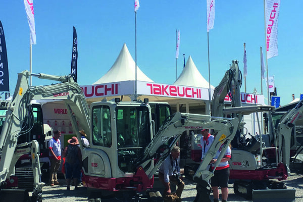 takeuchi digger in front of stand at hillhead show 2022