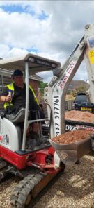 mark palmer broughton on a takeuchi digger