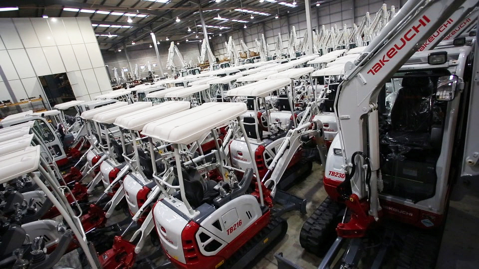 Record Breaking 2021 takeuchi excavators in a warehouse at Rochdale.