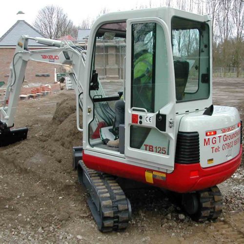 Takeuchi TB125 MGT Groundworks digging on a construction site