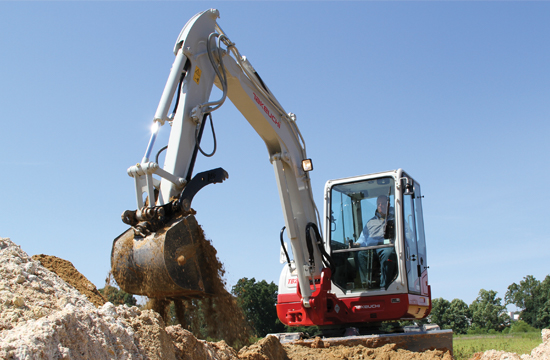 takeuchi tb230 digger on a building site